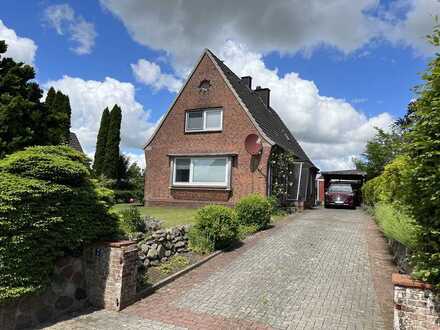 Einfamilienhaus mit Teilkeller auf entwicklungsfähigem Grundstück