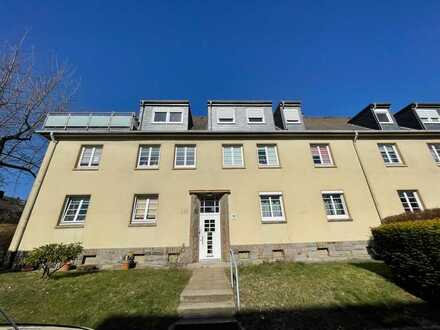 Schöne Erdgeschosswohnung mit Balkon in historischer Wohnsiedlung