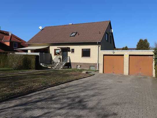 Frisch sanierte 4 Zimmer-Wohnung mit Terrasse, Gartennutzung und Garage