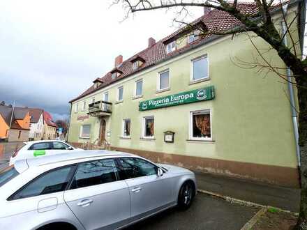 Gasthaus/Pizzeria mit Wohnungen und Nebengebäuden