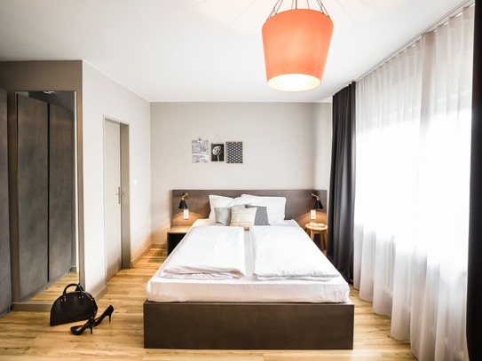 Studio mit Doppelbett - Modernes Apartment direkt an der Messe