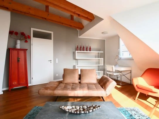 Large attic apartment with balcony in the Belgian quarter