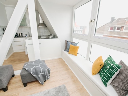 Cozy maisonette overviewing the city.