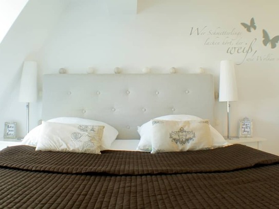 A fantastically bright attic apartment in the beautiful Kollwitzkiez