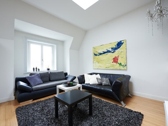 Penthouse in an old villa directly on the Alster Canal