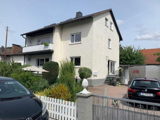 Mehrfamilienhaus in ruhiger Lage mit großem Garten und Garage