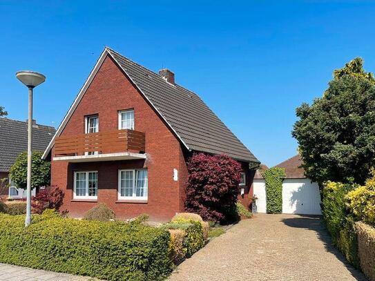 RESERVIERT - Einfamilienhaus mit Wintergarten und Garage in toller Siedlungslage von Neermoor