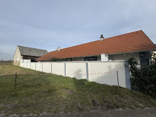 EINFAMILIENHAUS IN RUHELAGE MIT POTENTIAL