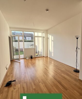 1,5-Zimmer Wohnung mit Gartenterrasse in generalsaniertem Neubau mit 11m2 Terrasse und einer tollen Raumhöhe!