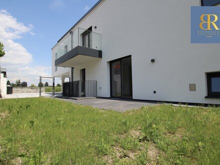 Erstbezug: 2 Zimmer Wohnung mit sonnigen Garten + PKW-Stellplatz