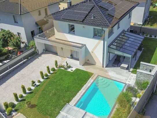 Hochwertiges Einfamilienhaus mit Garage, Pool und gepflegtem Eigengarten in Traun zu verkaufen!