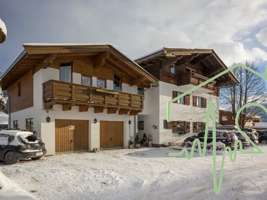 Apartmenthaus mit vielfältigen Möglichkeiten in Oberndorf/Tirol - Perfekt für Investoren!