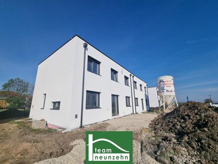 Ein Höchstmaß an Gemütlichkeit kombiniert mit modernem Design – Ziegelmassivhäuser mit tollem Garten – Hochwertige Auss…
