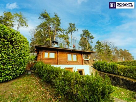 Entzückendes Grundstück mit sehr gepflegtem 100m² großem Holzhaus in exklusiver Aussichts- und Ruhelage! Wohnfläche kan…