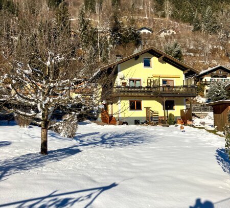 Zweifamilienhaus mit großzügigem Garten und Dachgeschossausbau