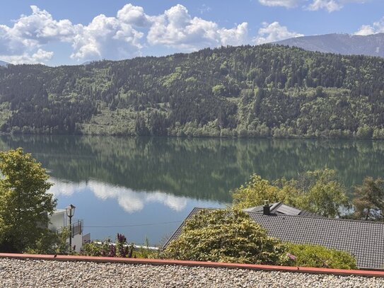 Moderne Wohnung mit wunderschönem Seeblick, inklusive Möbeln und Carport!