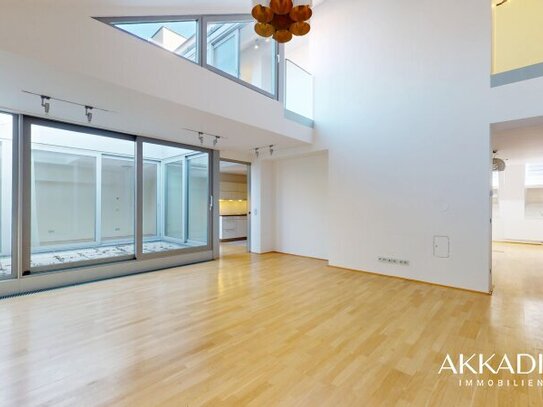 Dachgeschosswohnung in historischem Palais und exklusiver Lage mit Blick über die Karlskirche und Wien