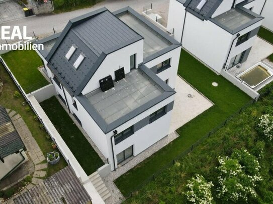 Neubau -Wohnung mit Dachterrasse und Garten