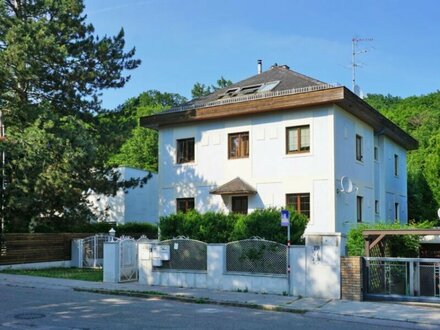 Mehrfamilienhaus mit bestandsfreier Familienwohnung in herrlicher, grüner Siedlungslage