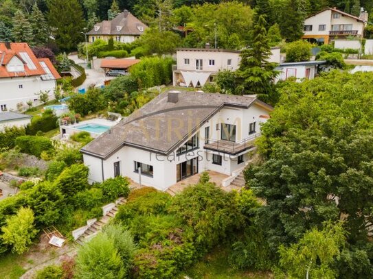 Exklusive Architektenvilla mit Schwimmteich, Gästehaus und idyllischem Garten