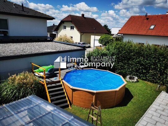 Moderne Doppelhaushälfte mit Pool, Garage und Garten