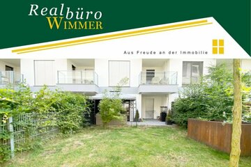 Zentrum: Neuwertige 2-Zimmer-Wohnung mit Garten und Tiefgarage