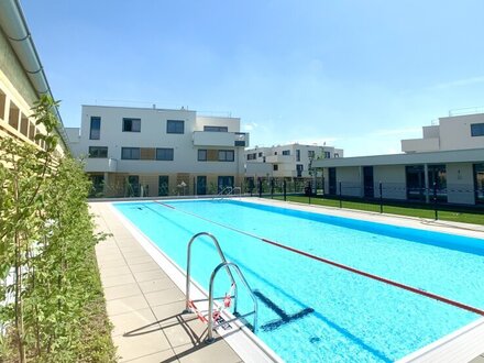 Moderne Dachterrassenwohnung im Wohnpark Giardino mit Pool! Erstbezug!
