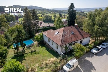 Großzügiges Einfamilienhaus mit parkähnlichem Garten im Zentrum