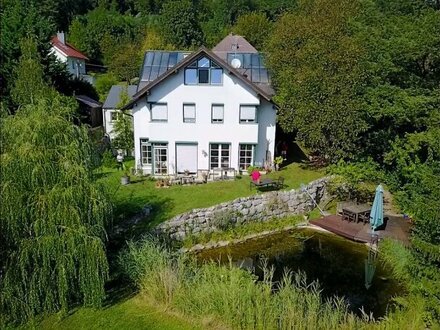 Architektenhaus mit Schwimmteich in bester Purkersdorfer Lage!