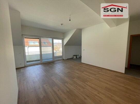 Geförderte 3-Zimmer Dachgeschosswohnung mit großen Balkon und KFZ-Parkplatz zu vergeben!