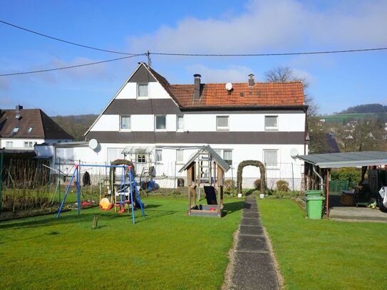 Hier ist Platz für die ganze Familie! Zweifamilienhaus mit familienfreundlichem Garten.