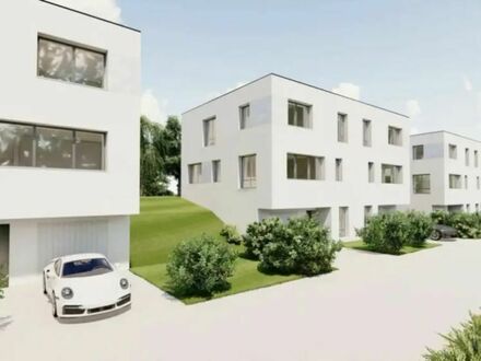 NEUBAU 
familienfreundliche DOPPELHAUSHÄLFTEN mit GARAGE 
in idyllischer Lage