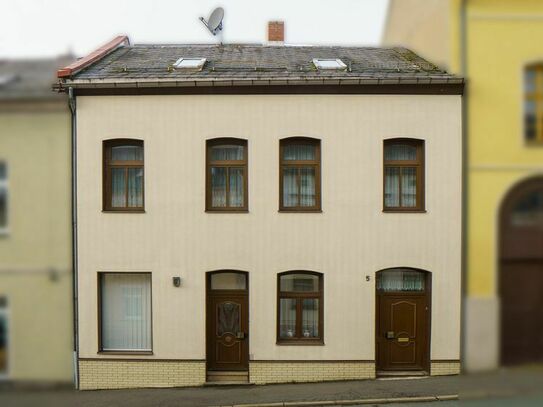 Gemütliches Stadtleben: Verkauf eines kleinen Reihenmittelhauses in Oelsnitz im Vogtland