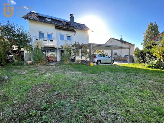 Modernes Einfamilienhaus mit Einliegerwohnung und Carport in zentraler Lage