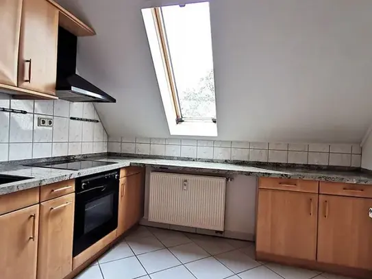 Charmante 3-Zimmer-Dachgeschosswohnung in historischem Altbau mit Blick über die Stadt