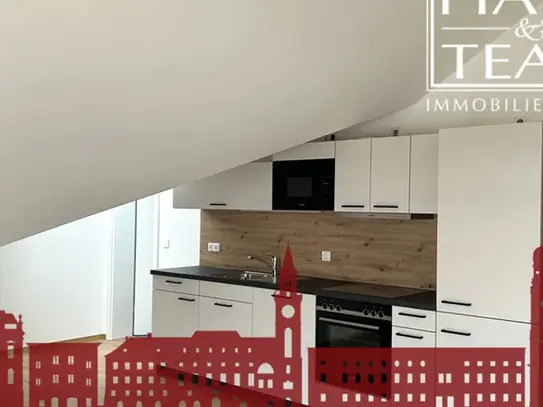 Moderne Dachgeschosswohnung mit Balkon!