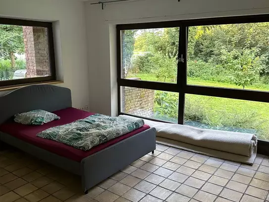 Beautiful room with a view of the greenery in Cologne