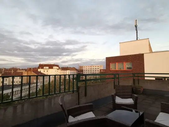 Upscale penthouse in Mitte-Nord with a huge 65sqm roof terrace and an amazing view