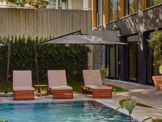 Modern apartment mezzanine (with 2 beds or a couch) inclusive of outdoor pool, co-working and gym in Munich Obersendling