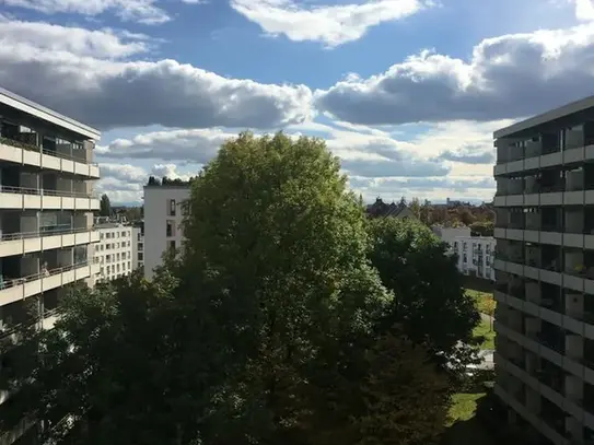 Modern apartment in Schwabing with south-facing balcony and view of the Alps