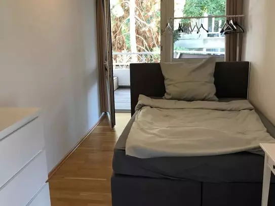 Room with balcony in a co-living apartment in Frankfurt
