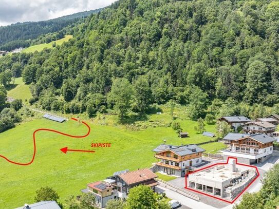 Grundstück an der Skipiste mit Baugenehmigung für ein Luxuschalet