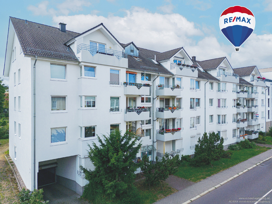 Charmante Eigentumswohnung mit Balkon + Blick ins Grüne + TG-Stellplatz