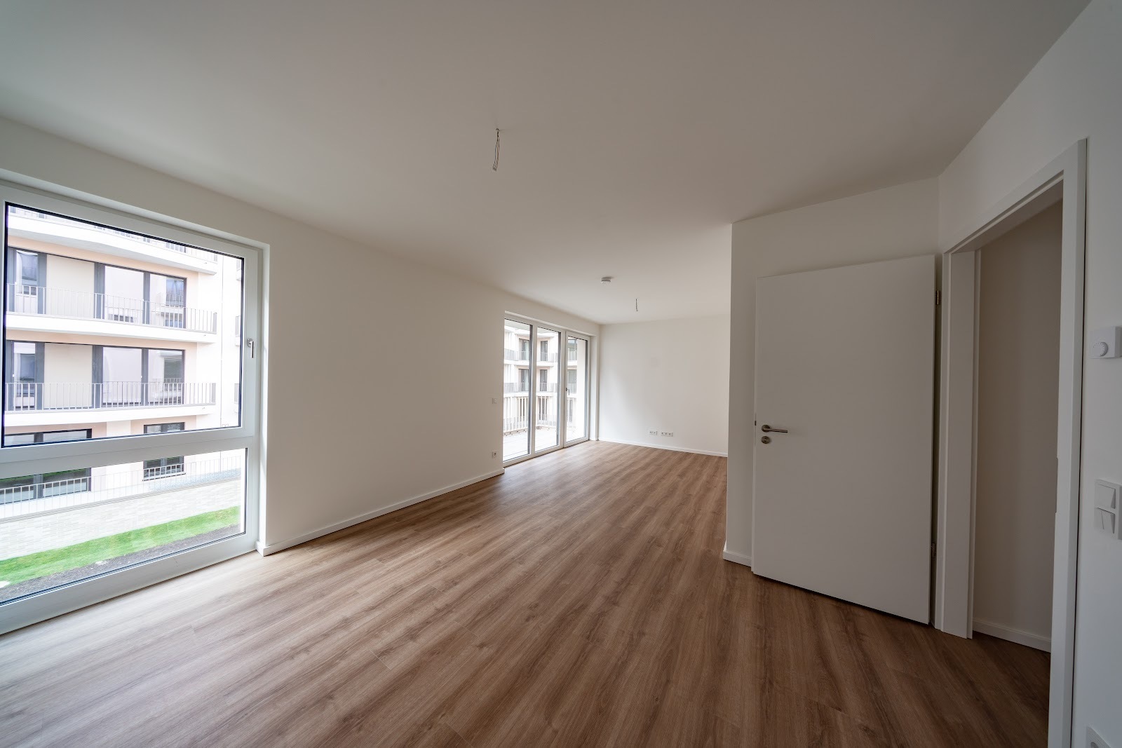 Neubauwohnung mit Fußbodenheizung und Balkon / WBS 220 erforderlich - Photo 1