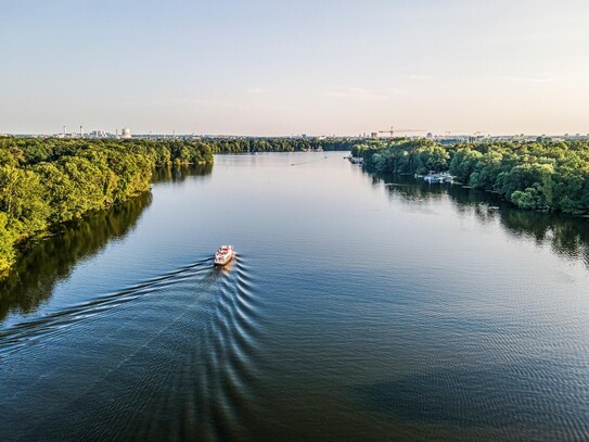 Dachgeschossneubau mit Wasserblick - Potenzial zu verkaufen!