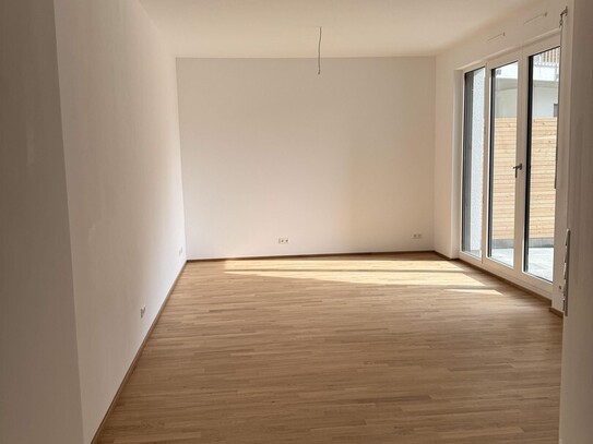 Moderne 2-Zimmer Wohnung mit Terrasse, EBK und TG Stellplatz - Erstbezug!