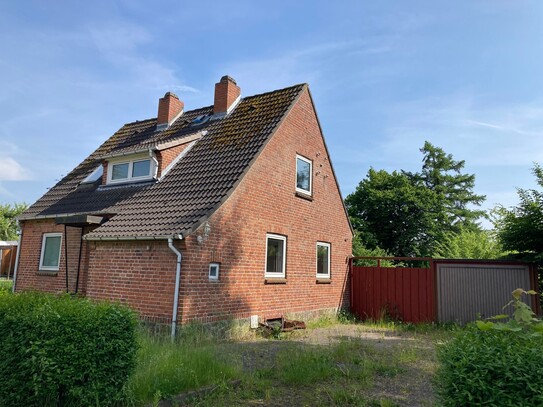 Einfamilienhaus (sanierungsbedürftig) mit zusätzlichem Bauplatz