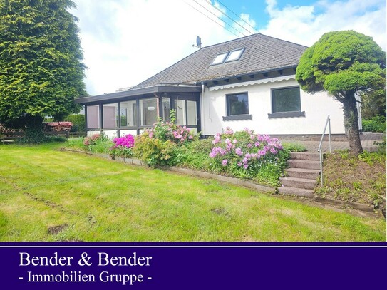 Freundlicher Bungalow mit Wintergarten und Einbauküche in ruhiger Lage.