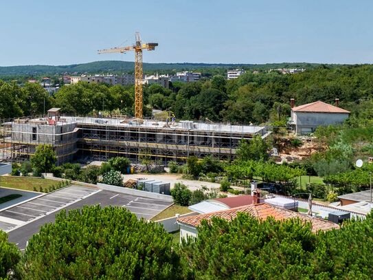 ISTRIEN, LABIN - Wohnung mit Garten in einem neuen Gebäude