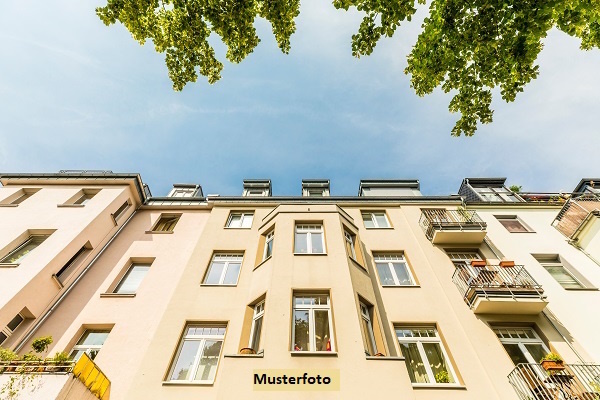 Mehrfamilienhaus mit Ladenlokal in zentraler Lage